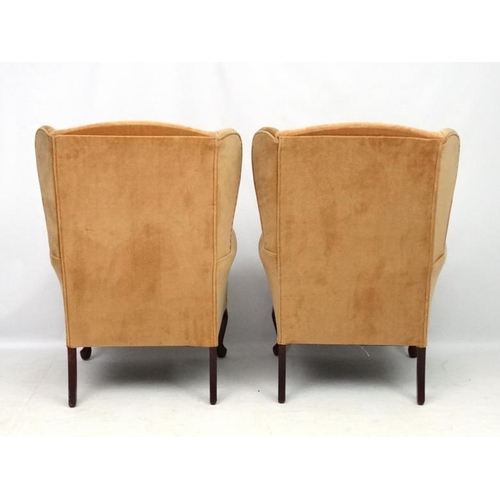 302 - A pair of Victorian style wing back arm chairs 42'' high