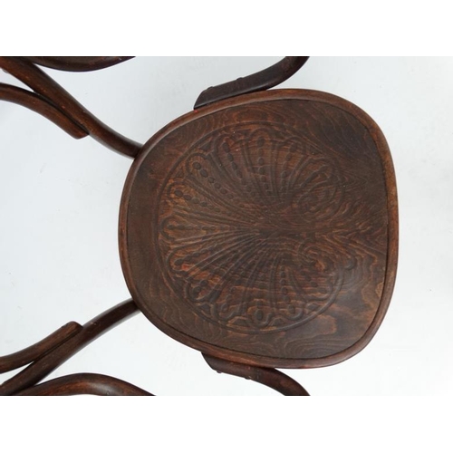 303 - Mundus & J & J Kohn Ltd : A c.1900  Bentwood open armchair ( labelled under)