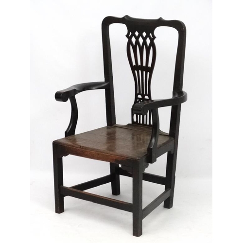 305 - An 18thC Chippendale oversized country open arm chair 45 1/4'' high x 30 1/4'' wide