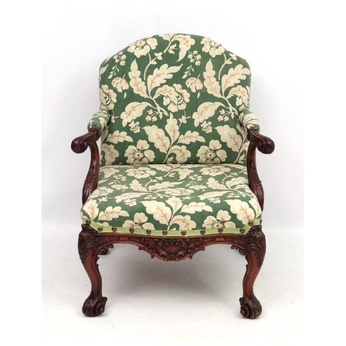 312 - A 19thC Chippendale mahogany open elbow chair with upholstered  back  and seat 40'' high