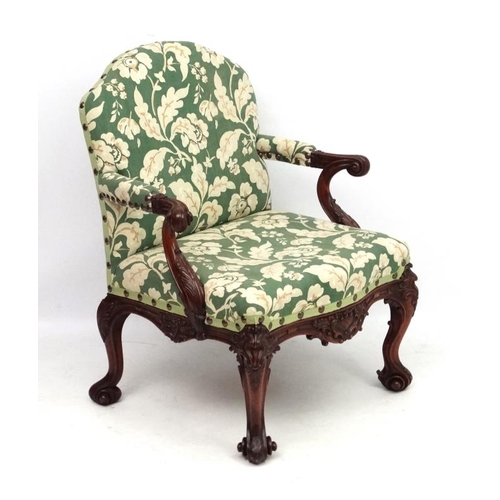 312 - A 19thC Chippendale mahogany open elbow chair with upholstered  back  and seat 40'' high