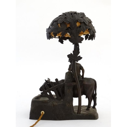 319 - An early 20 thc Cast bronze lamp in the form of an ox watering ( at underllit glass watertrough ) wi... 