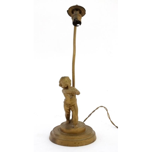 321 - An early 20 thC gilt spelter table lamp formed as a young figure with a bird on a circular socle 14 ... 