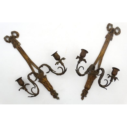 331 - Light : A  pair of early - mid 20thC gilt brass wall sconces , each with two arms , in the Neo- clas... 