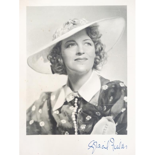 377 - A signed print of the Actress '' Gracie Fields '', signed in blue ink , The whole approx 10'' x 13''... 