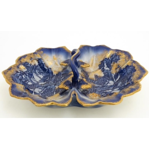 520 - A Victoria ware Ironstone flow blue (flo-blue) style two sided dish with handle , decorated with flo... 