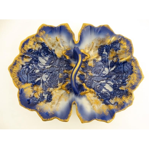 520 - A Victoria ware Ironstone flow blue (flo-blue) style two sided dish with handle , decorated with flo... 