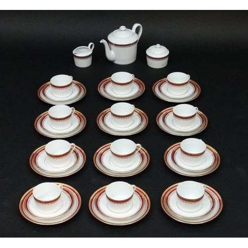 523 - An extensive Tharaud , Limoges porcelain 12 place dinner service and tea set by the Camille Tharaud ... 