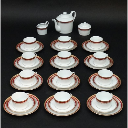 523 - An extensive Tharaud , Limoges porcelain 12 place dinner service and tea set by the Camille Tharaud ... 