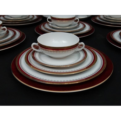 523 - An extensive Tharaud , Limoges porcelain 12 place dinner service and tea set by the Camille Tharaud ... 