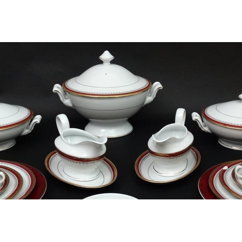 523 - An extensive Tharaud , Limoges porcelain 12 place dinner service and tea set by the Camille Tharaud ... 