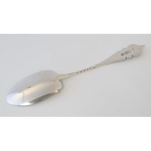 536 - A silver preserve spoon with shaped handle and spade formed bowl with engraved decoration 6'' long (... 