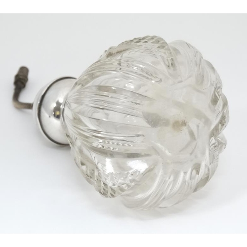 537 - A cut glass scent bottle with the silver mounts hallmarked Chester 1909 maker James Deakin & Sons.