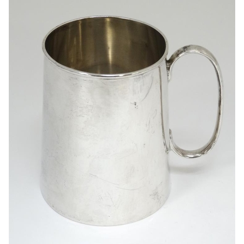 540 - A silver Christening mug / tankard  with loop handle. Hallmarked Sheffield 1917 maker Fenton Brother... 