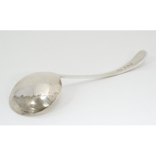 543 - A silver sauce ladle with feather edge handle hallmarked Birmingham 1966 maker  Joseph Gloster Ltd. ... 