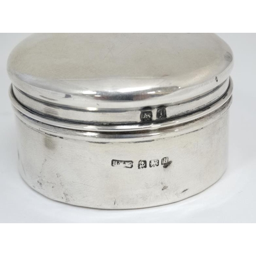 554 - A silver pot and cover with paper pin tape coil within. Hallmarked Birmingham 1910 maker Henry Willi... 