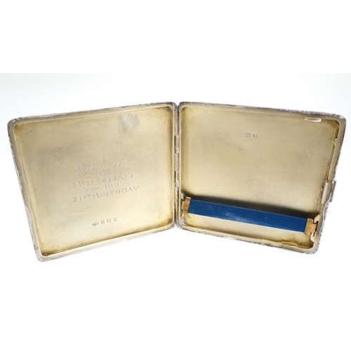 560 - A silver cigarette case with engine turned decoration. Hallmarked Birmingham 1927 maker Adie Bros Lt... 