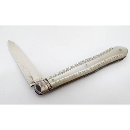 561 - A Victorian silver folding fruit knife with mother of pearl handle. Hallmarked Sheffield 1874  maker... 