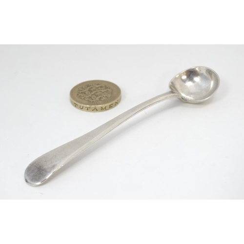 586 - A Geo III Old English  pattern salt spoon. Hallmarked London 1799 maker Peter & Anne  Bateman 3 3/4'... 