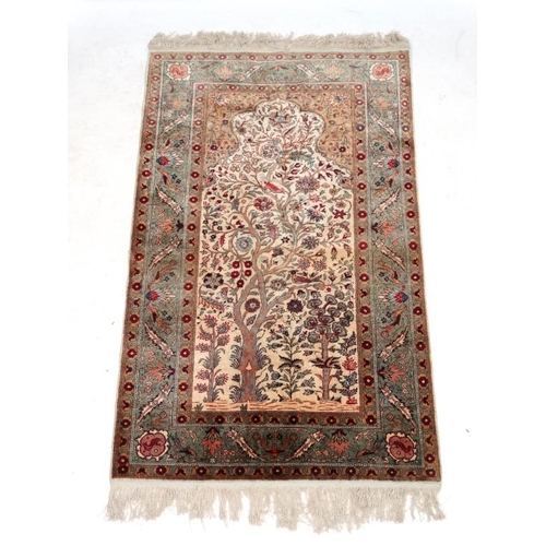 59 - Carpet / Rug:  an antique Kafiri Turkish pure silk prayer rug with central tree design having birds ... 