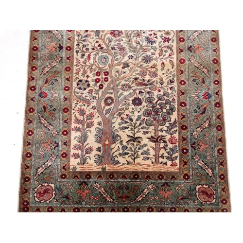 59 - Carpet / Rug:  an antique Kafiri Turkish pure silk prayer rug with central tree design having birds ... 