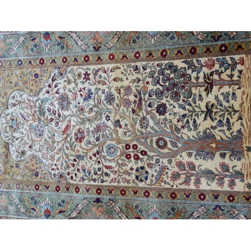 59 - Carpet / Rug:  an antique Kafiri Turkish pure silk prayer rug with central tree design having birds ... 