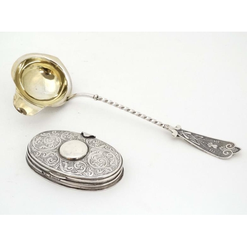 592 - A white metal ladle with gilded bowl together with a Victorian silver oval box hallmarked London 198... 