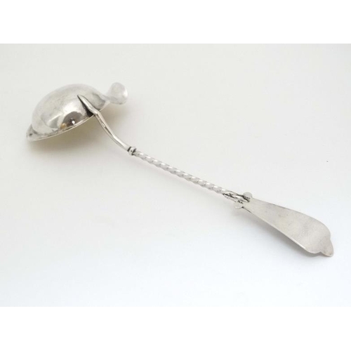 592 - A white metal ladle with gilded bowl together with a Victorian silver oval box hallmarked London 198... 