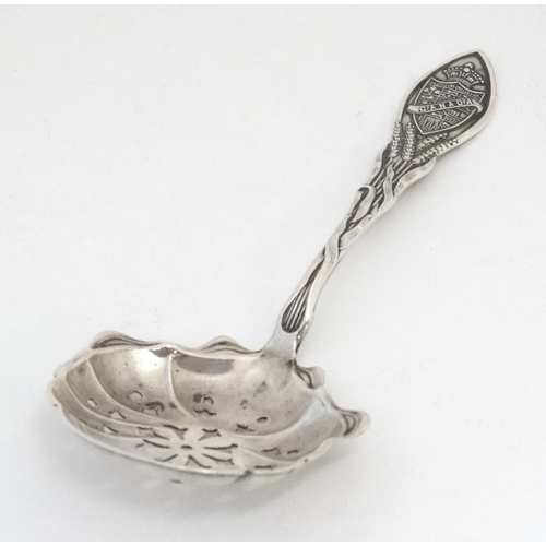 594 - A Canadian Sterling silver sifiter spoon 5'' long