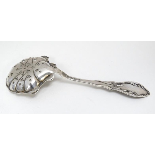 594 - A Canadian Sterling silver sifiter spoon 5'' long