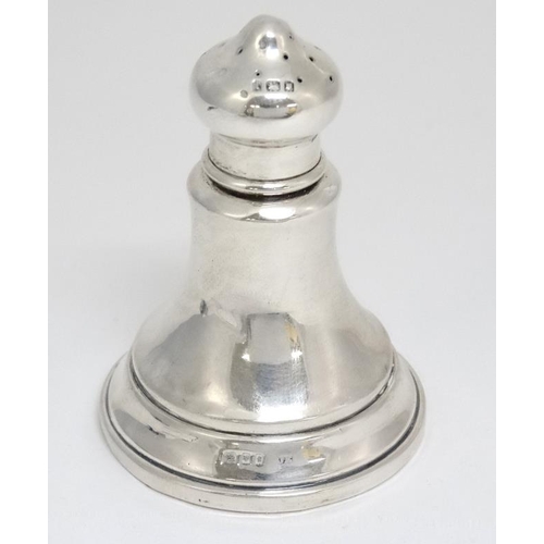 599 - A silver pepperette hallmarked London 1924 maker JE. 3'' high