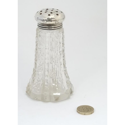 602 - A cut glass caster with silver top hallmarked Birmingham 1909 maker Francis Howard Ltd.  4 3/4''