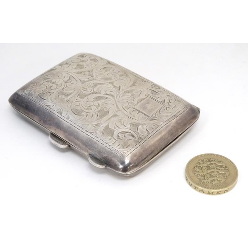 625 - A silver cigarette case with engraved decoration. Hallmarked Birmingham 1931 maker Mayes Mills & Co.... 