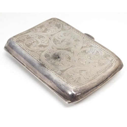 625 - A silver cigarette case with engraved decoration. Hallmarked Birmingham 1931 maker Mayes Mills & Co.... 