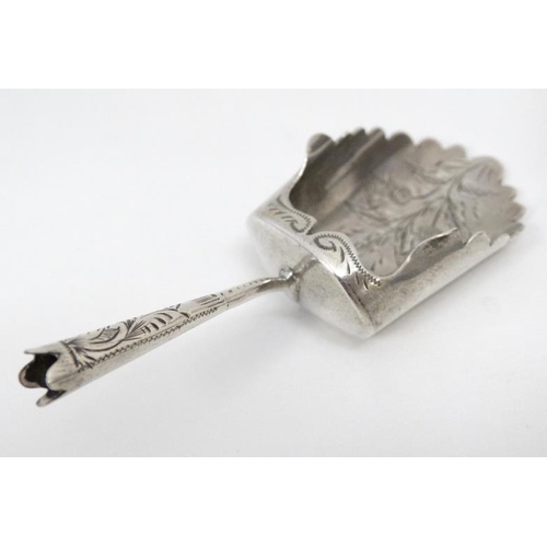 626 - A silver caddy spoon of shovel form 3'' long Hallmarked Birmingham 1900 together with a silver toppe... 