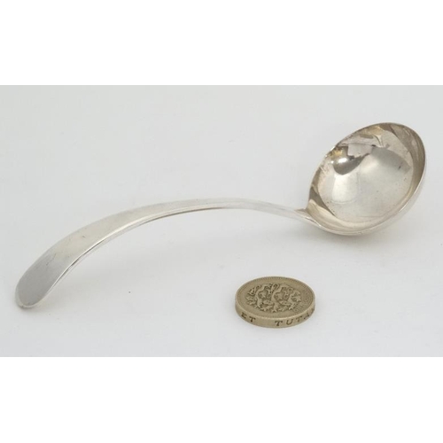 645 - A silver sauce ladle hallmarked  Sheffield 1962 maker  Viners Ltd  approx 5'' long (32g)