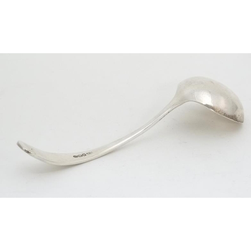 645 - A silver sauce ladle hallmarked  Sheffield 1962 maker  Viners Ltd  approx 5'' long (32g)