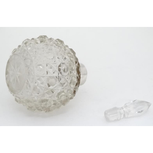 646 - A cut glass scent bottle of spherical form with white metal collar The whole 3 3/4''  high