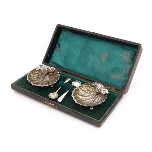 656 - A pair of salts of scallop shell form hallmarked Birmingham 1905 maker William Devenport together wi... 