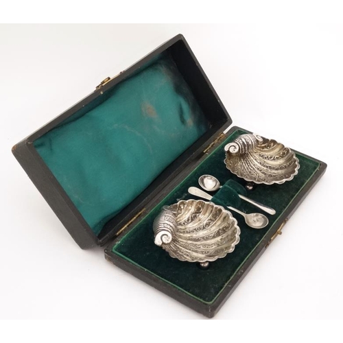 656 - A pair of salts of scallop shell form hallmarked Birmingham 1905 maker William Devenport together wi... 