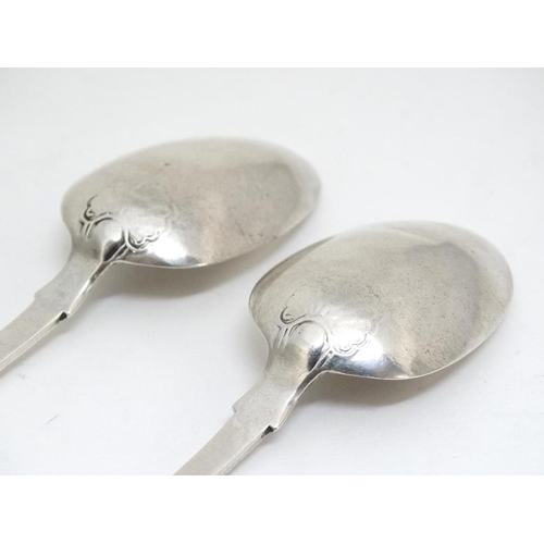 657 - A pair of silver fiddle and shell pattern teaspoons hallmarked Newcastle 1861 maker Thomas Sewell 5 ... 