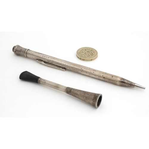 663 - A silver Eversharp pencil engraved ' Permacel Tapes Ltd' hallmarked London 1952 together with a retr... 