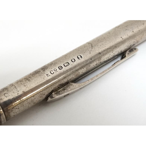 663 - A silver Eversharp pencil engraved ' Permacel Tapes Ltd' hallmarked London 1952 together with a retr... 