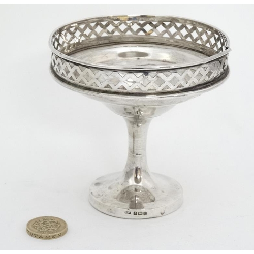 664 - A silver pedestal bon bon dish  with pierced gallery. Hallmarked Birmingham 1918 maker Levi & Salama... 