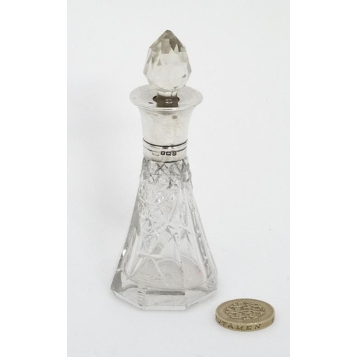 665 - A cut glass scent bottle with silver collar hallmarked Birmingham 1917 4'' high