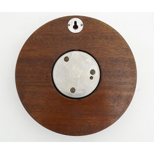 67 - Aneroid Barometer : an early- mid 20thC mahogany cased aneroid barometer with open workings, silvere... 