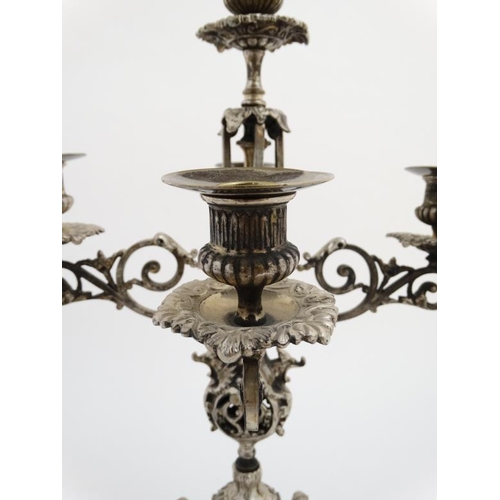 671 - A late 19thC / early 20thC silver plated 5-branch table candleabrum / candleabara. Approx 20'' high