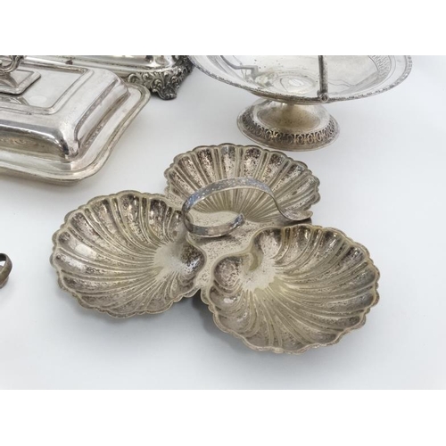 674 - A quantity of  assorted silver plated wares to include entre dishes, vase, cake basket etc.