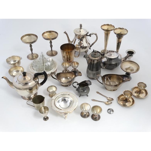 675 - A quantity of assorted silver plated wares to include part tea sets, vases etc