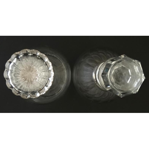 688 - Two 19thC glass 3 ring decanters , one with engraved armorial and inscription to top of stopper ' Tr... 